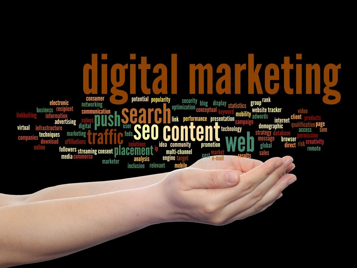 Concept or conceptual digital marketing seo or traffic abstract word cloud in hand isolated on background metaphor to business, market, content, search, web, push, placement, communication technology